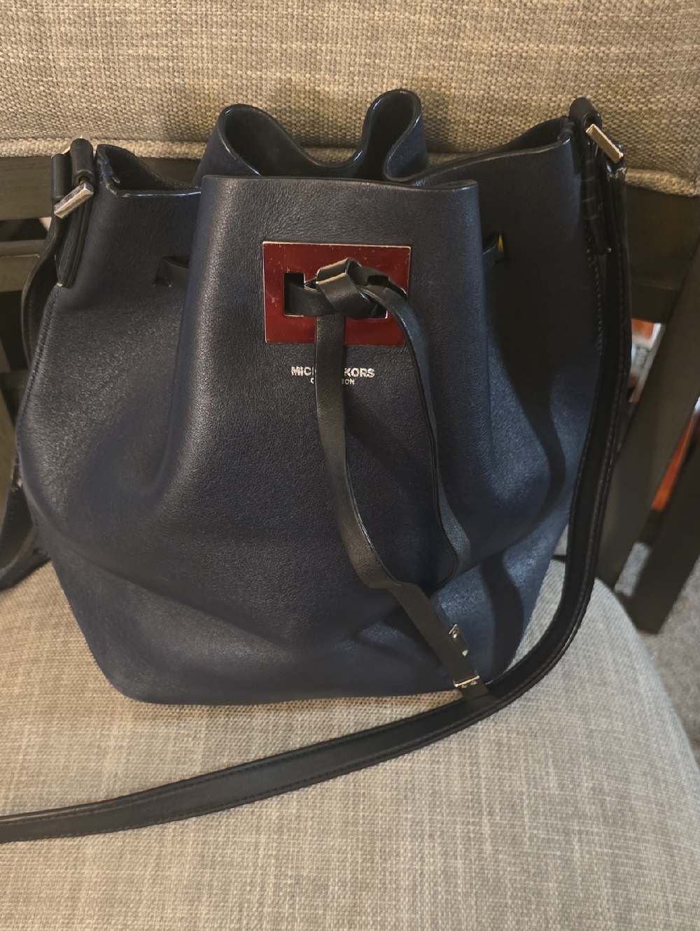 Michael Kors Navy Leather Drawstring Crossbody Bucket Bag with Red Accent